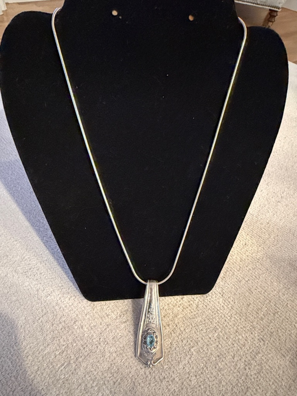 Silver Teardrop Pendant Necklace with Blue Stone Accent